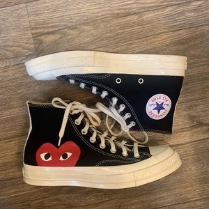 Comme des Garcons Play
Peek-A-Boo HighTop Sneakers